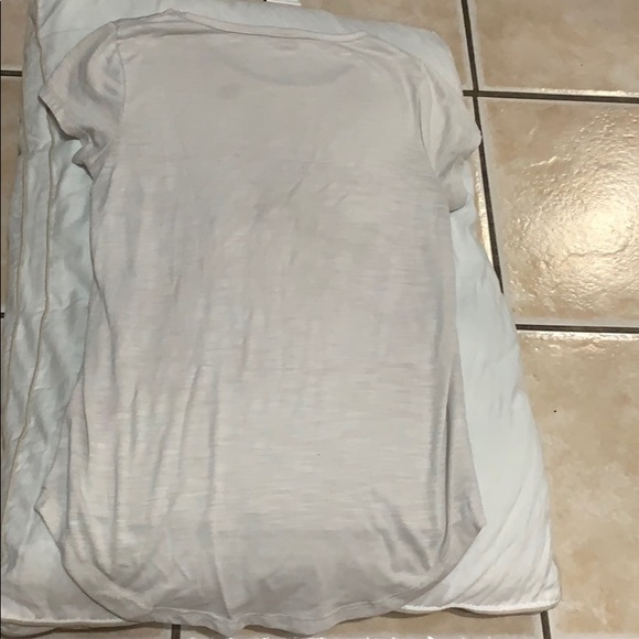 Shirt with writing on it. - Picture 2 of 2